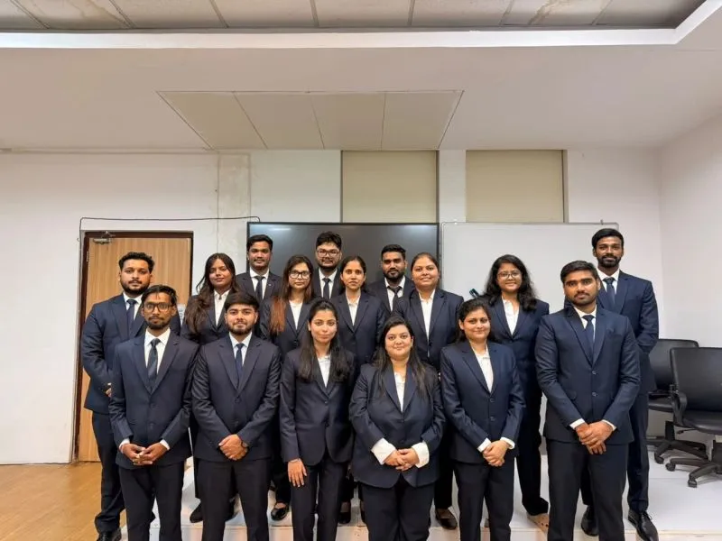 Banking branch staff in brand-consistent corporate uniforms