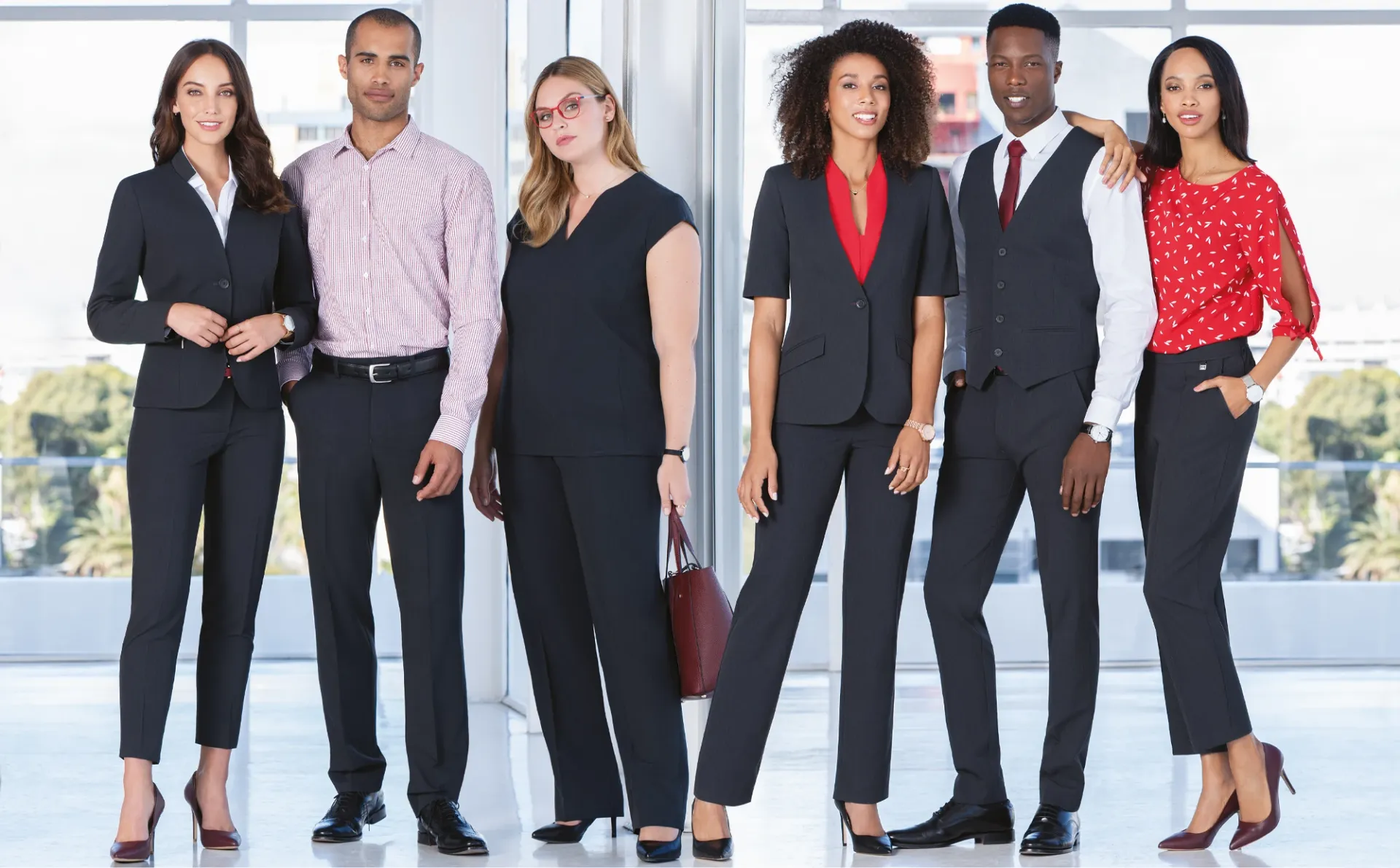 Coordinated corporate uniform team across store locations in a modern retail environment