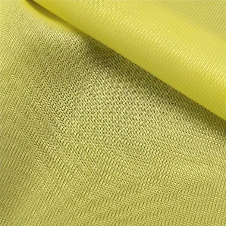 Smooth tightly-woven solid polyester fabric for professional safety vests — wind-resistant close-up