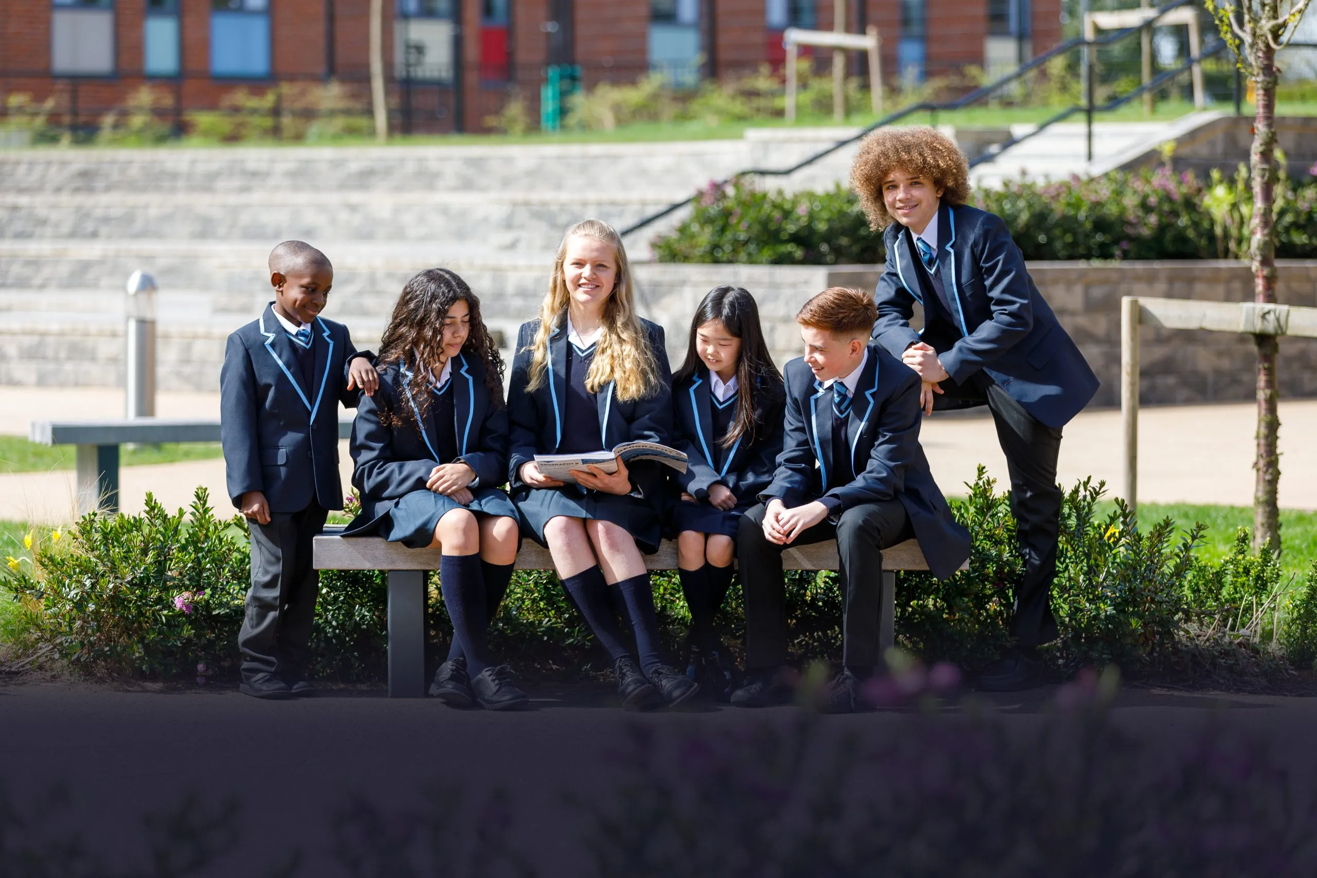 UK school children in uniforms — factory-direct school uniform manufacturing for the UK