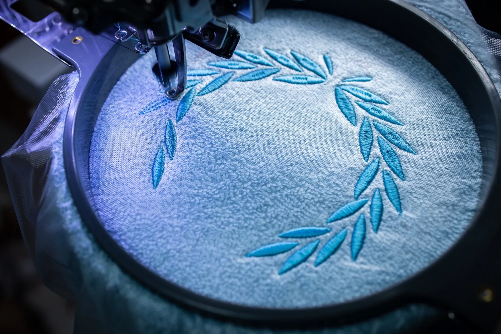 Close-up of embroidery digitizing screen showing stitch path mapping at LantaoWork