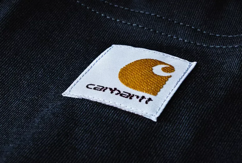 Woven label detail on private label workwear