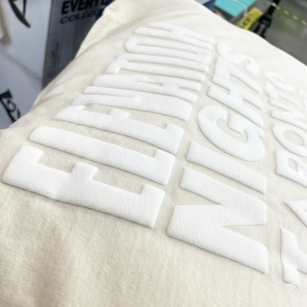 Puff screen print with raised 3D texture on work jacket