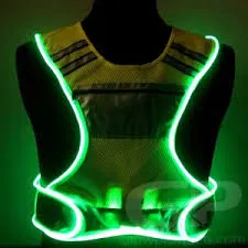 Glow in the dark screen print charging under light on safety vest