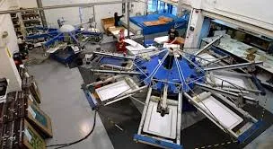 Screen printing production floor with automated presses and ink stations