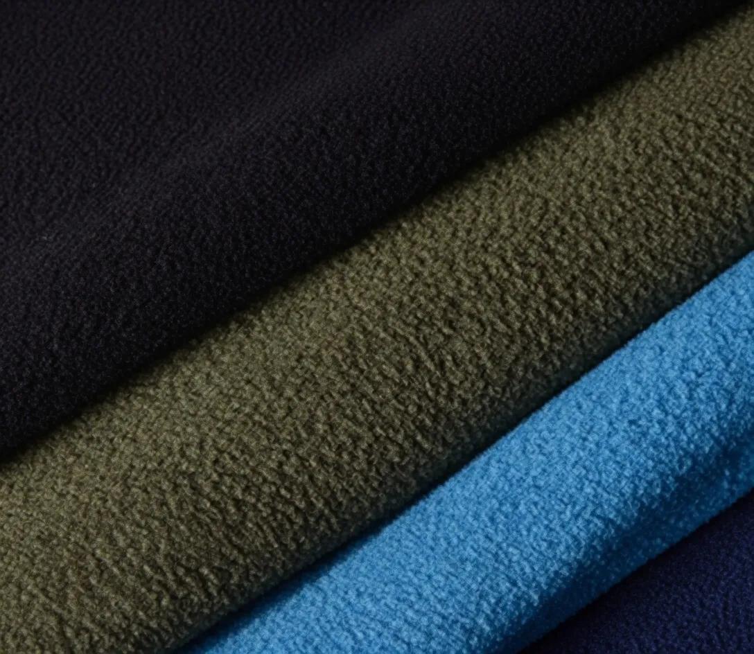 Warm fleece winter uniform fabric close-up showing textured surface